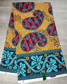 DESCRIPTION African Ankara Fabric. This is high quality African print is 100% cotton and it's 45 inches wide. It is used for making African Clothing, African quilts, & For Home decoration. FYI: Print is Double sided. The listing is for 3yards and 6yards Each piece of fabric measures: 105 - 108in by 45in for 3yards 210 - 216in by 45in for 6yards If you purchase more than one yard, you will receive one continuous piece. *If you require more than what I have listed, feel free to send me email. CARE Red African Print, African Quilts, Clean And Press, Head Wrap Headband, African Ankara, Fabric Headbands, African Print Fabric, Ankara Fabric, Mixing Fabrics