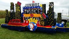 an inflatable bouncer with the words juniors justice on it and other decorations