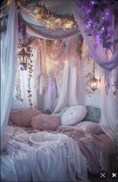 a canopy bed with white curtains and purple lights on the headboard is surrounded by pillows