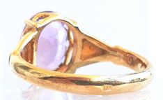 Size: 15 - Total weight: 2.77 gRing England Edwardian period, circa 1920-1930 In 18K gold Large amethyst weighing approx. 3.5 ct (11 x 9 x 5 h) Weight: 2.77 g Gold hallmarks ( Art Deco Gold Amethyst Ring, Gold Amethyst Art Deco Ring, Gold Art Deco Amethyst Ring, Gold Oval Amethyst Ring In Art Deco Style, Gold Amethyst Art Deco Ring Collectible, Gold Art Deco Amethyst Ring Collectible, Antique Gold Amethyst Ring Hallmarked, Gold Hallmarks, Zenith Watches