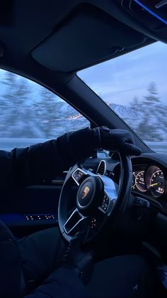 the interior of a car with dashboard lights and steering wheel