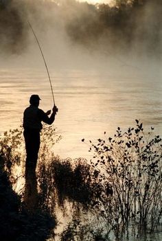 an image of a man fishing in the water