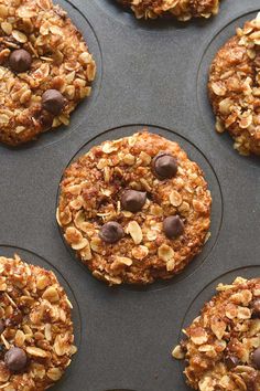 muffins with chocolate chips and oatmeal on top in a baking pan