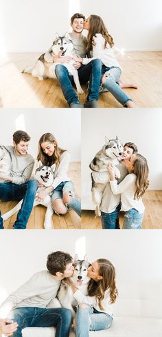 a couple cuddles with their dog while sitting on the floor in front of them