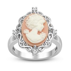 PRICES MAY VARY. An alluring ring in 925 sterling silver with cameo, oval in shape on a elegantly carved portrait placed on a background of pink color encircled with white sapphire Dimension - L:21.1 MM, W:19.2 MM, H:23.2 MM Packaging & Return – All our Jewelry pieces come with a beautiful jewelry box. 30 days no question asked return policy. Jewelili Promise - All our Diamonds and Gemstones are conflict free and are finely crafted in high-quality materials. With an unparalleled dedication to qu Art Deco Emerald Ring, Oval Diamond Ring, White Sapphire Ring, Cameo Jewelry, Cameo Ring, Sterling Silver Studs, White Sapphire, Blue Diamond, Sterling Ring