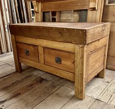 a large wooden chest sitting on top of a hard wood floor