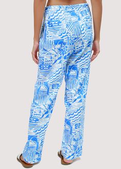 Experience the essence of summer in our Nautical Dream Pants. These lightweight pants are perfect for tropical weather, complete with a drawstring waist and pockets. Coordinate with the matching shirt or a knit top for a chic and feminine look. WPWH04148 Imported Self: 100% Cotton Lining: 100% Rayon Model is 5 ft 9.5 inches; Bust: 32", Waist: 24", Hips: 34" and wearing a size Small Runs true to size Hand wash or wash with gentle cycle with cold water with like colors, Air dry to avoid shrinkage Dream Pants, Tropical Weather, Lightweight Pants, Graphic Sweaters, Classic Pants, Summer Pants, Printed Drawstring, Swim Accessories, Feminine Look