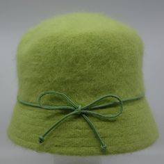 Brand New With Tags Elegant Luxe Angora Hats With Bows In Different Colors. This Beautiful Lime Green Angora Blend Hat Can Be Worn With The Pleather Bow On The Side Or In Back. Perfect For Your Hat Collection! Material: 80% Angora, 20% Polyester Size: Small / Medium (21 - 22 Inches) Brim: 1 3/4 Inches Wide Lining: None Paris Hat, Love Your Melon Beanie, Accessories Elegant, Hat With Bow, Faux Fur Wrap, Trapper Hats, Knitted Flowers, Hat Collection, Red Felt