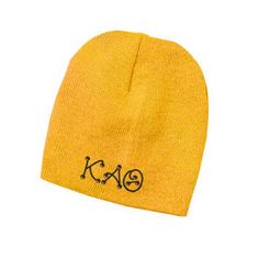 a yellow beanie with the word kale written on it and six different colors