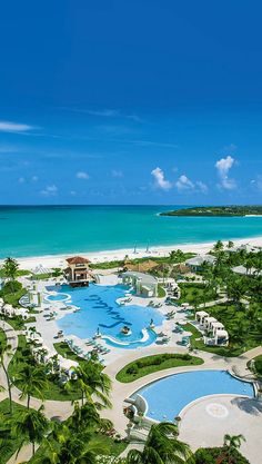 an aerial view of the beach and pool area at sandals resort in cancucilla, mexico