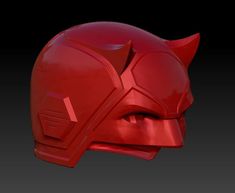 a red helmet with horns on top of it