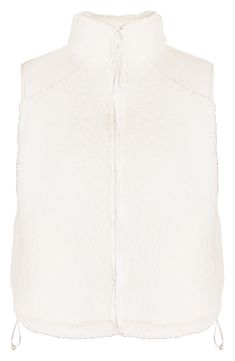 With its relaxed fit and cozy curly fleece, this layer-ready vest will be the first thing you reach for as soon as the temps start to dip. 21 1/2" length ( size medium) Stand collar 100% polyester Machine wash, dry flat Imported Luxury Sportswear, Lily White, Leather Lingerie, Sweaty Betty, Running Jacket, Long Crop Top, Fleece Vest, Cashmere Coat, Casual Coat