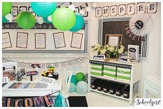 a room filled with lots of green and white decorations on the wall above a desk