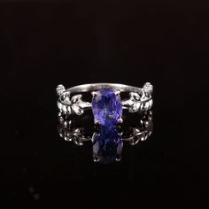 925 Sterling Silver, Tanzanite Oval With Beautiful Design Engagement Ring, Beautiful Ring For Gift. ✔✔Metal Material-Solid 925 Sterling Silver ✔✔Stone Measurement is 6x8 MM ✔✔Natural Tanzanite  ✔✔1.25-1.30 CT Approx. Weight Of Stone ✔✔ Weight Of The Ring Is 1.85 Grams December Birthstone ✔✔Please note that there Can be slight variations in stone texture and color shades in the actual product that you receive. Stone quality or grade will be same. Because We Use Natural Stones And All Natural Ston Design Engagement Ring, Stone Texture, Natural Tanzanite, December Birthstone, Multi Stone Ring, Beautiful Ring, Designer Engagement Rings, Multi Stone, Metal Material