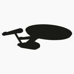 a black and white image of a star trek vehicle silhouetted against a white background