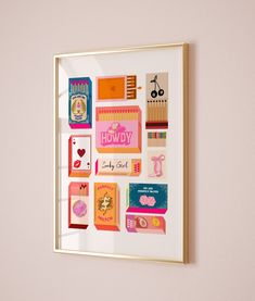 a framed art piece on the wall above a bed with pink walls and white sheets