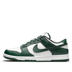 The Nike Dunk Low 'Michigan State' is a classic sneaker that pays homage to its “Be True To Your School” origins. Introduced over three decades ago, the Dunk Low became an icon of expression across popular culture, from skateboarding to modern art. This summer, it returns in a timeless colorway featuring a white leather upper with Varsity Green leather overlays and Swoosh logos. The woven retro Nike logo tongue labels and heel embroidery nod to the original Dunks from 1985. (SNKR/Skate/Men's/Lig Nike Dunk Low Michigan State, Dunk Low Michigan, Sb Dunks, Shoe Palace, Dr Shoes, Nike Models, Michigan State Spartans, Mens Lifestyle, Air Jordan 1 Mid