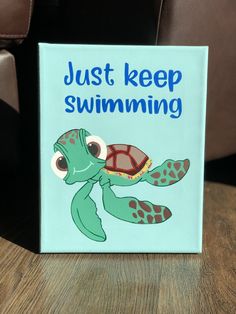 a book with an image of a turtle on it that says, just keep swimming