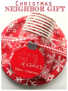 a red and white plate with a christmas ornament on it that says, let us do the dishes merry christmas