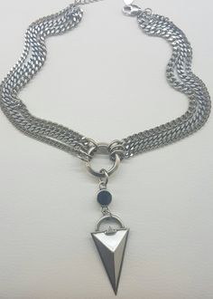 WE RESPECT ALL CREDIT CARDS VIA PAY PAL ♦ A silver triple chain choker, made of silver-plated brass in very high quality, with an O-Ring, a Swarovski stone and a large silver triangle pendant decorating its center. ♦ This piece of jewelry is perfect as a gift for yourself, for a wedding day, Valentine's day or a birthday. If you're interested in sending a gift to a third party, just write your message to the recipient and I will do so with joy. ♦ The jewel will be sent by registered mail (to som Silver Punk Jewelry With Double Chain, Edgy Metal Jewelry With Double Chain, Edgy Double Chain Metal Jewelry, Edgy Silver Double Chain Necklace, Gold Coin Choker, O Ring Choker, Silver Link Necklace, Gold Link Necklace, Choker Silver