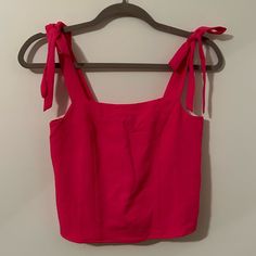 Hot Pink Crop Tank With Ties. Ruched Back Never Worn Has Tags Summer Pink Tops With Tie Straps, Trendy Pink Tie-back Top, Trendy Pink Tie Back Top, Pink Tops With Tie Straps For Day Out, Red Casual Tie Back Top, Pink Cotton Tops With Tie Straps, Casual Cropped Tops With Tie Straps, Casual Tie Back Tank Top For Brunch, Casual Tops With Tie Straps For Brunch