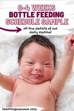 a baby laying on top of a white blanket next to a sign that says bottle feeding schedule sample