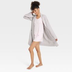 This Waffle Robe from Auden™ lets you lounge in comfort and style. Made from woven waffle-texture fabric, this long-sleeve robe features a regular fit and a split neckline for an elegant look. The front-tie design with an adjustable belt allows you to choose how you want to relax in this comfortable robe, and two front pockets give you plenty of space for stashing your phone and other small items. Auden™: Comfort true to every shape & hue. Comfortable Relaxed Fit Outerwear For Lounging, Relaxed Fit Comfortable Outerwear For Lounging, Relaxed Fit Soft Texture Cardigan For Loungewear, Soft Texture Long Sleeve Cardigan For Loungewear, Soft Long Sleeve Cardigan For Loungewear, Long Sleeve Cardigan With Soft Texture For Loungewear, Soft Texture Cardigan For Loungewear, Spring Loungewear Cardigan With Soft Texture, Casual Robe For Relaxation