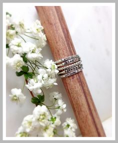 Create your own unique stacked ring set right here! Add it to a ring you already have or start right here from scratch. Looking for a ring with words, a name, or a date on it, check out my other listing below! It's a best seller on Etsy! https://www.etsy.com/listing/519883417/custom-stackable-name-ring-made-to-order?ref=shop_home_feat_3&bes=1 Choose between a variety of styles: ◊ Round ◊ Textured (faceted) ◊ Beaded ◊ Wooden ◊ Twisted ◊ Square ✮ ✮ ✮ ✮ ✮ ✮ ✮ ✮ ✮ ✮ ✮ ✮ ✮ ✮ ✮ ✮ ✮ ✮ ✮ ✮ ✮ ✮ ✮ ◊Th Simple Ring Band, Stackable Name Rings, Ring Bands, Silver Rings Simple, Name Rings, Simple Ring, Rings Simple, Faceted Bead, Wooden Beads