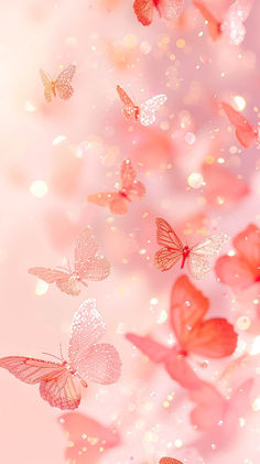 many pink butterflies flying in the air with boket lights behind them and blurry background