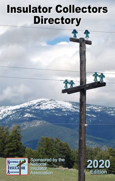 an insulator collector's directory cover with mountains in the background and power lines