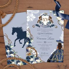 a blue and white wedding card with a horse on it