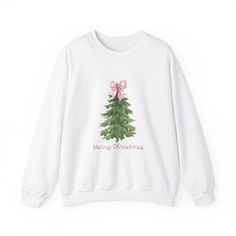 A cozy and stylish sweatshirt featuring a watercolor Christmas tree with a bow design. Perfect for the colder months, this sweatshirt offers a comfy wearing experience with a classic fit and crew neckline. Ideal for anyone looking to add a festive touch to their winter wardrobe or for those who love holiday-themed apparel. Product features - Made with a medium-heavy fabric blend of 50% cotton and 50% polyester for warmth and comfort - Ribbed knit collar with seam for elasticity and shape retenti White Winter Sweatshirt For Gift, White Winter Sweatshirt Gift, White Sweatshirt For Winter Gift, White Winter Sweatshirt As A Gift, White Embroidered Sweatshirt As Winter Gift, Cute Christmas Jumpers, Cute Christmas Sweaters, Cute Christmas Sweater, Xmas Jumpers