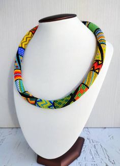 Check out this item in my Etsy shop https://www.etsy.com/listing/682527802/rainbow-bead-jewelry-bead-crochet Adjustable Crochet Necklaces With Round Beads, Beaded Crochet Rope Patterns, Crochet Bead Rope Pattern, Beaded Rope Necklace Blue And Gold, Crochet Beaded Necklace Inspire Uplift ⭐, Necklace Crochet, Necklace Bead, Crochet Rope, Rainbow Beads