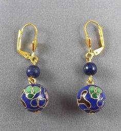 "- Materials:  10mmX10mm blue Cloisonne beads, Lapis Lazuli gemstone beads. - Length: 1.\" - Closure: Golden plated leverback hooks, nickel free, lead-free" Handmade Royal Blue Round Beads Jewelry, Sapphire Jewelry With 8mm Beads, Blue Round Beads Earrings For Jewelry Making, Nickel-free Blue Round Bead Jewelry, Sapphire Jewelry With 8mm Beads As Gift, Blue 8mm Beads Jewelry For Gift, Blue Lapis Lazuli Drop Earrings, Blue 8mm Bead Jewelry For Gift, Blue Lapis Lazuli Jewelry With Ear Wire