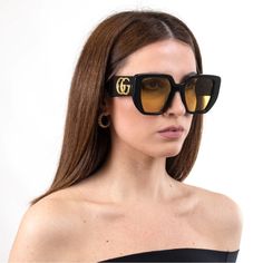 Gucci Acetate Square Frame Sunglasses Gg0956s Black This Is An Authentic Pair Of Gucci Acetate Square Frame Sunglasses Gg0141s In Black. These Bold Sunglasses Have Black Oversized Square Frames With Translucent Yellow Lenses. The Arms Are Black And Feature A Gold Gg Logo At The Hinge. Size Length: 5.75 In Height: 2.50 In Width: 5.75 In Luxury Gucci Cat Eye Sunglasses For Summer, Gucci Sunglasses With Mirrored Lenses For Evening, Gucci Luxury Cat Eye Sunglasses For Evening, Luxury Acetate Cat Eye Sunglasses, Luxury Evening Sunglasses In Acetate, Sleek Gucci Party Sunglasses, Gucci Designer Cat Eye Sunglasses With Mirrored Lenses, Designer Gucci Cat Eye Sunglasses With Mirrored Lenses, Trendy Gucci Acetate Sunglasses