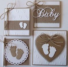 four cards with baby footprints and hearts on them, tied up in twine ribbons