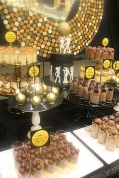 desserts and candies are on display at a party