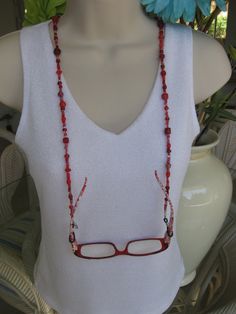 Red Eyeglass Chain Red Necklace Eyeglass by RalstonOriginals, $15.00 Red Wire Wrapped Beaded Necklace For Gift, Red Glass Jewelry For Beach, Unique Red Glass Necklace, Handmade Red Glass Necklaces, Red Beaded Glass Jewelry, Handmade Red Glass Necklace, Red Beaded Glasses Chains As Gift, Red Beaded Glasses Chains For Gift, Red Glass Glasses Chains As A Gift