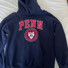 Brand New Blue University Of Pennsylvania Hoodie Size Small With Logo On The Front And Red “Penn” Lettering Blue Winter College Style Sweatshirt, Winter Hoodie With School Spirit Long Sleeve, Winter School Spirit Long Sleeve Hoodie, Winter School Spirit Hoodie, Upenn Sweatshirt, Upenn University, Yale Hoodie, University Merch, University Hoodies