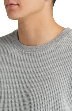 Add an extra layer of cozy warmth to your look with this T-shirt made from a thermal knit that helps trap heat with its waffle texture. 28" length Crewneck Long sleeves with ribbed cuffs 65% polyester, 35% cotton Machine wash, tumble dry Imported Ribbed Crew Neck Tops For Winter, Winter Ribbed Tops For Layering, Winter Waffle Knit Sweatshirt For Layering, Knit Tops With Ribbed Cuffs For Layering, Knit Tops With Ribbing And Crew Neck, Winter Crew Neck Tops In Waffle Knit, Winter Waffle Knit Tops With Crew Neck, Winter Waffle Knit Top With Crew Neck, Crew Neck Waffle Knit Sweatshirt For Layering