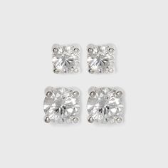 Complete any of your ensembles with a dash of sparkle with this Sterling Silver Duo Round Cubic Zirconia Stud Earring Set 2pc - A New Day™ Clear. Constructed from sterling silver, this set of cubic zirconia studs come in two different sizes — giving you several options to choose from. Showcasing round-cut, clear cubic zirconia stones held secure in a four-prong setting, these brilliant earrings are both simple and elegant to wear. Gender: female. Age Group: adult. Pattern: Solid. Initial Pendant Necklace, Cubic Zirconia Earrings, Zirconia Earrings, Necklace And Earring Set, Initial Pendant, Stud Earrings Set, Chain Pendant, Fun Earrings, Earring Backs