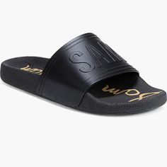 Sam Edelman Ira Slide Sandal Size 8 Black W/Gold Details & Care An Embossed Logo Brings Signature Style To An Italian Slide Sandal Crafted With A Contoured Footbed. Flat Sole Synthetic Upper, Lining And Sole Made In Italy Item # 7182305 Black Slides With Leather Sole For Vacation, Black Slides With Removable Insole And Flat Heel, Black Slides With Leather Sole And Flat Heel, Black Leather Sole Slides For Summer, Black Leather Sole Slides, Black Leather Footbed Flip Flops, Black Leather Footbed Open Toe Flip Flops, Black Synthetic Slides With Leather Sole, Black Synthetic Flip Flops With Leather Footbed