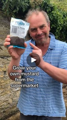 a man holding up a bag of dirt in front of his face and the words grow your own mustardard from the supermarket