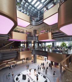 people are walking around in the atrium of a building with multiple levels and pink lighting