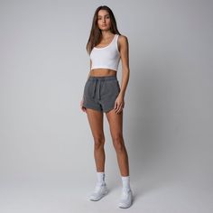 Combining our best selling short shape with our best selling fabric. This Women’s Heavyweight Classic gives a new luxe approach to our classic short. The weighted fabric allows for a more premium construction giving you an effortless elevated Summer look. 100% cotton  Heavyweight  Tonal Stitching  Adjustable Drawstring Sporty High-waist Cotton Athletic Shorts, Sporty High Waist Cotton Athletic Shorts, Basic Loungewear Shorts, Sporty High Waist Cotton Shorts, Sporty Cargo Shorts With Built-in Shorts, Fitted Cotton Shorts Mid-thigh Length, Fitted Cotton Mid-thigh Shorts, Fitted Cotton Mid-thigh Length Shorts, Basic Shorts With Elastic Waistband