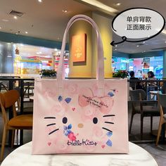 Sanrio Hello Kitty Shoulder Bag Pink Tote / Large Shopper Shopping Bag Pu Leather Large Shopping Bag/Tote 26.5x34x12 Inches, Strap Height 23.5 Inches Cute Large Capacity Bag For Shopping, Cute Large Capacity Shopping Bag, Kawaii Style Shoulder Bag As Gift, Cute Cat Design Shoulder Bag For Daily Use, Cute Shopping Bags With Zipper Closure, Cute Large Capacity Square Bag, Hello Kitty Print School Bag, Rectangular, Hello Kitty Print School Bag, School Bag With Hello Kitty Print