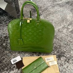 Louis Vuitton Preowned Alma Gm (Previously The Mm) - Currently The Largest Alma Monogram Vernis Color: Vert Tonic Date Code: Mi3078 Wallet Also Available. See Separate Listing Or Message Me About Bundling. Overall Great Condition - Shows Minor/Minimal Signs Of Wear. Zipper Works Well. Exterior Shows No Transfer Marks. Minor Interior Fading/Discoloration. Slight Wear To Bottom Edges/Corners - See Photos Piping Intact. Minimal Hardware Tarnish, Mostly Shiny. Comes With Original Dust Bag, Tag, Lock Nike Fashion Shoes, Bag Tag, Nike Fashion, Louis Vuitton Bag, Fashion Shoes, Dust Bag, Limited Edition, Bag Lady, Louis Vuitton