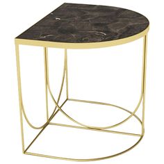 a black and gold side table with marble top