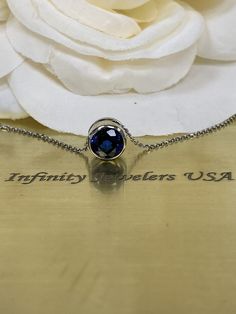 Sapphire floating pendant, bezel set necklace 14k white gold , 18 inch diamond cut cable chain #5871 #GiftsForHer #BridalGift #FloatingNecklace #TravelNecklace #BridalSet #GiftForHer #NecklaceGift #SapphirePendant #BridalJewelry #BirthdayGift 14k Gold Sapphire Jewelry With Prong Setting, White Gold Necklace With Diamond Cut Lab-created Sapphire, Round Lab-created Sapphire Necklace With Diamond Cut, Round Diamond Cut Necklace With Lab-created Sapphire, Round Diamond Cut Lab-created Sapphire Necklace, Lab-created Sapphire Diamond Cut Necklace, Diamond Cut Lab-created Sapphire Necklace, Sapphire Jewelry With Vvs Clarity In Round Shape, White Gold Necklace With Birthstone And Lab-created Sapphire