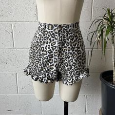 80s UPDATE High Waisted Leopard Print Cotton Denim Ruffled Booty Shorts
These 1980’s vintage shorts from Update are made from a leopard print, cotton denim and feature a high waisted, booty short fit with a super cute and flirty ruffled hem. Zips in front with a Talon zipper to a single button closure at the waist. In excellent vintage condition with only minimal signs of wash and wear.

Marked a size 11/12, see below for measurements

26” waist
37” hips
12” rise
2.5” inseam

#vintage #80s #highwaisted #ruffled #shorts Ruffled Shorts, Star Dress, Vintage Shorts, Skorts, Chicago Il, Short Outfits, American Vintage, Printed Cotton, Women's Shorts